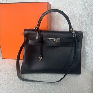 Hermès Black Leather Handbag with Silver Accents